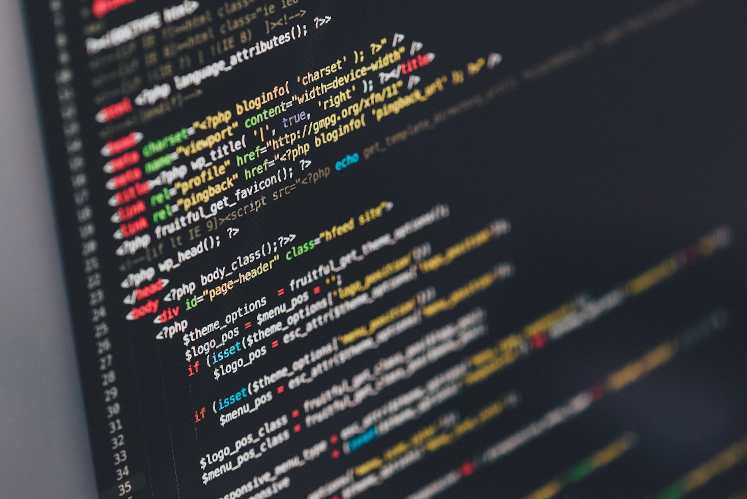 Modern workspace with computer showing Python code
